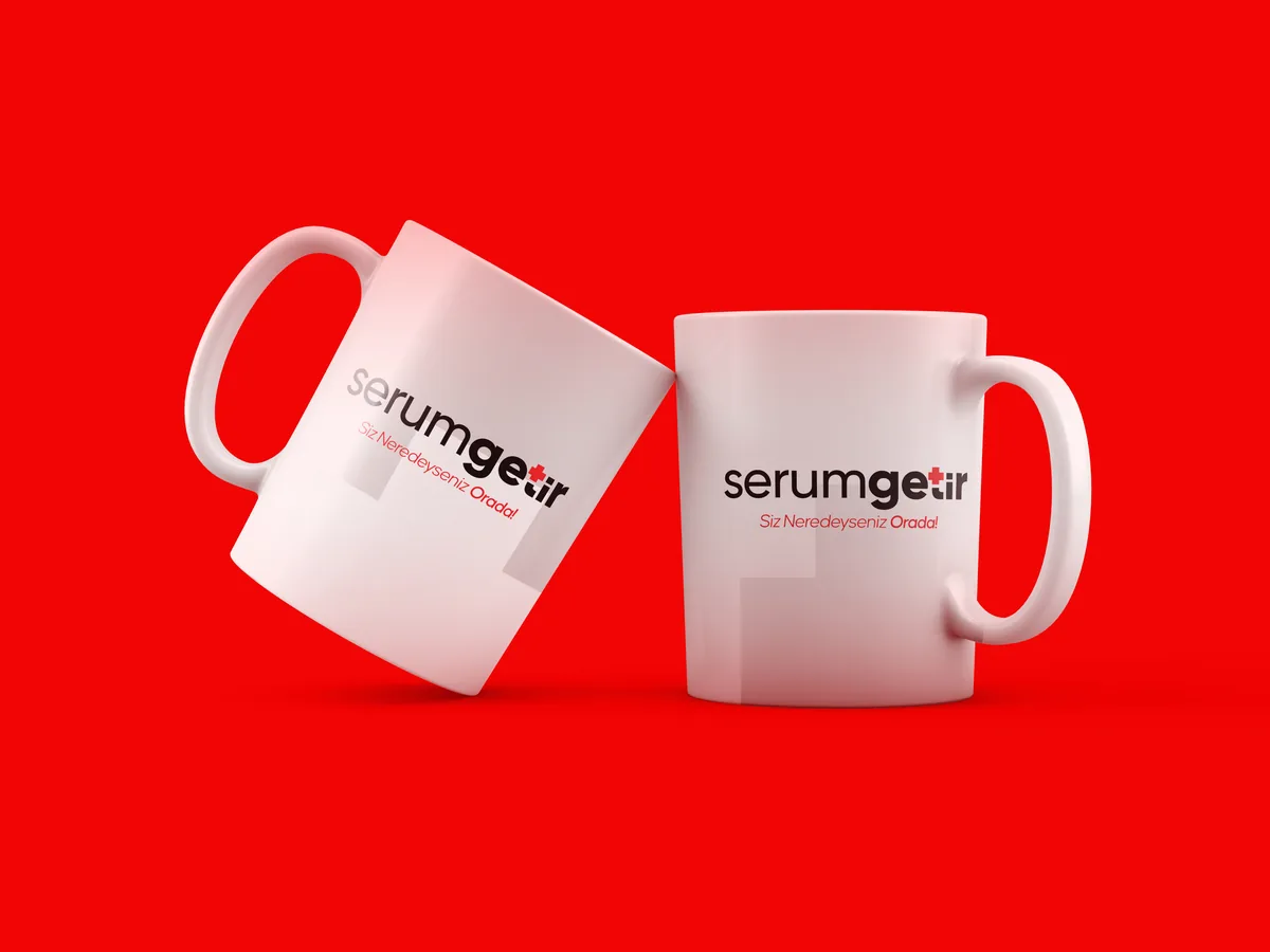 Two white mugs with the logo on red.